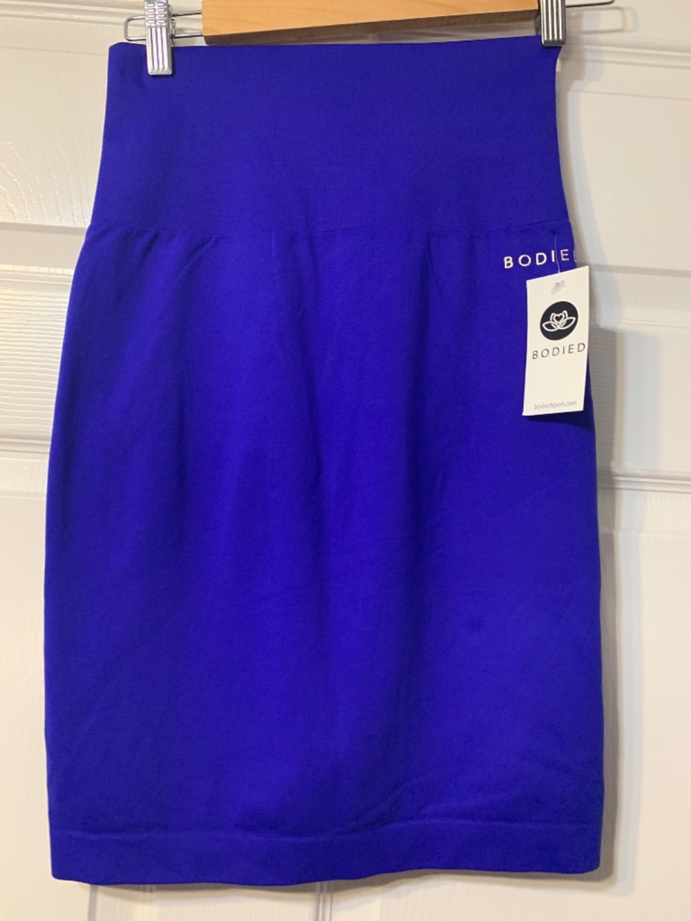 3 pack bodied by j skirts (large, black pink, and blue)